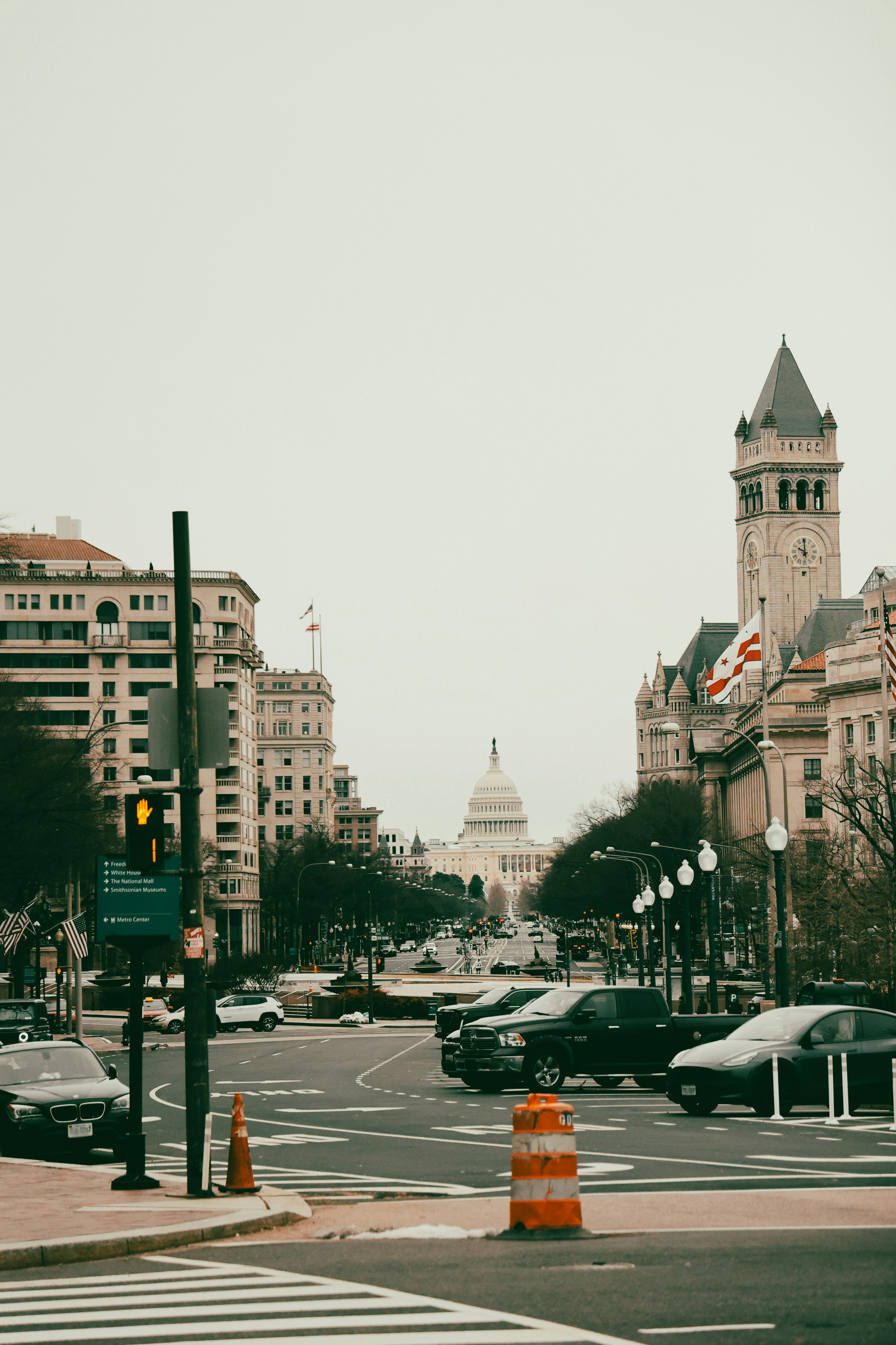 The u.s. capitol building sits at the end of the street.
