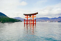 A large body of water with a red structure in the middle of it
