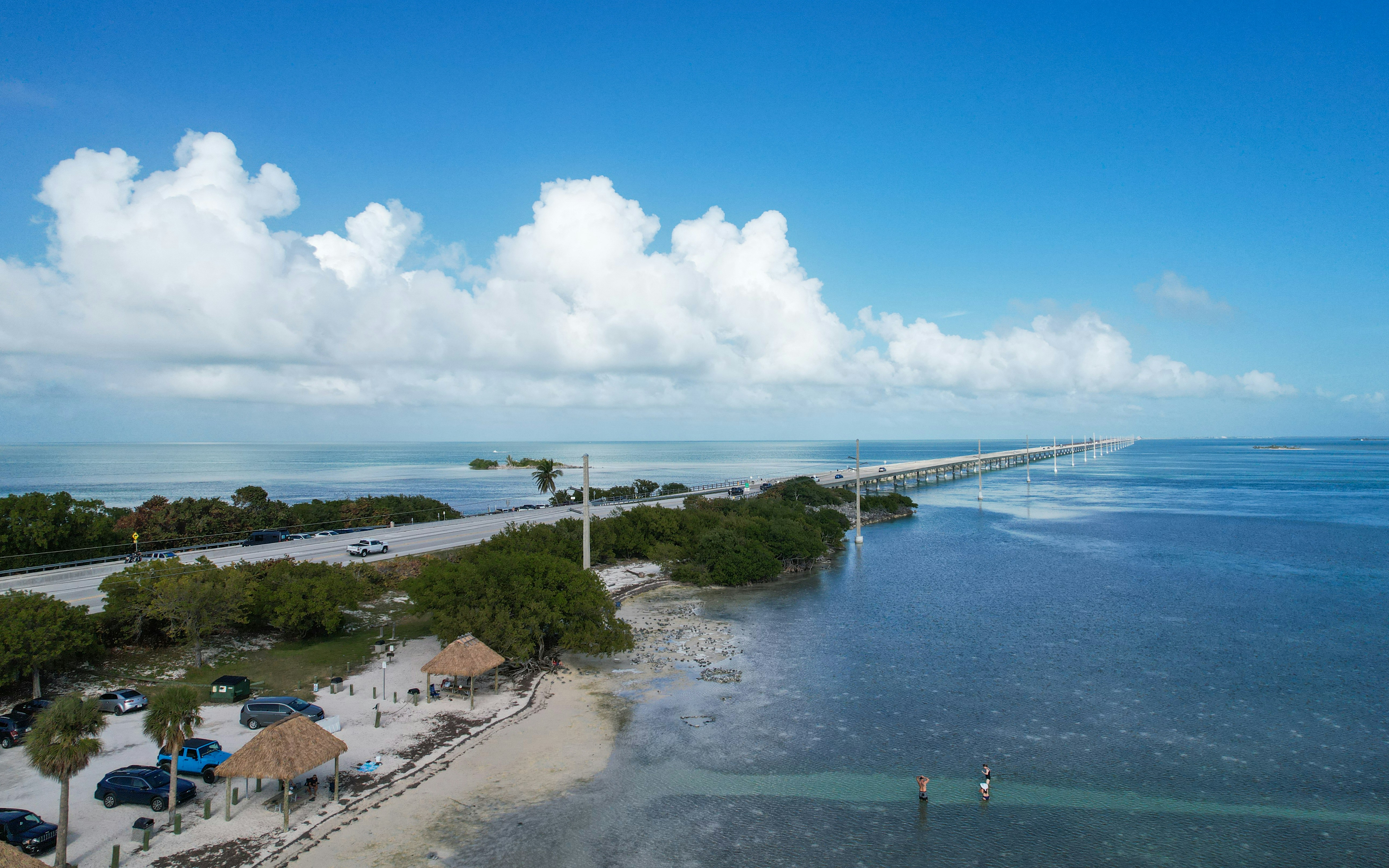 A stunning aerial view of the Florida Keys, showing the turquoise water and lush green islands.