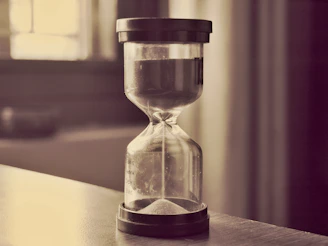 An hourglass counts down time