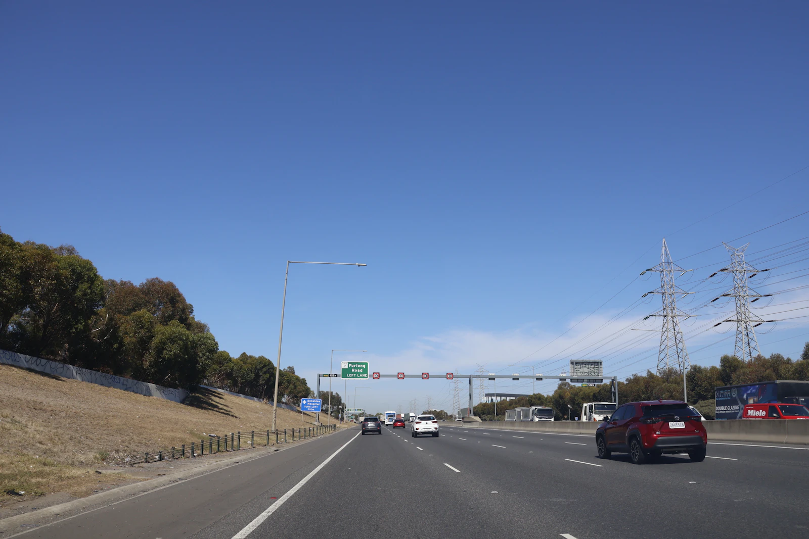 Traffic travels through an Australian city