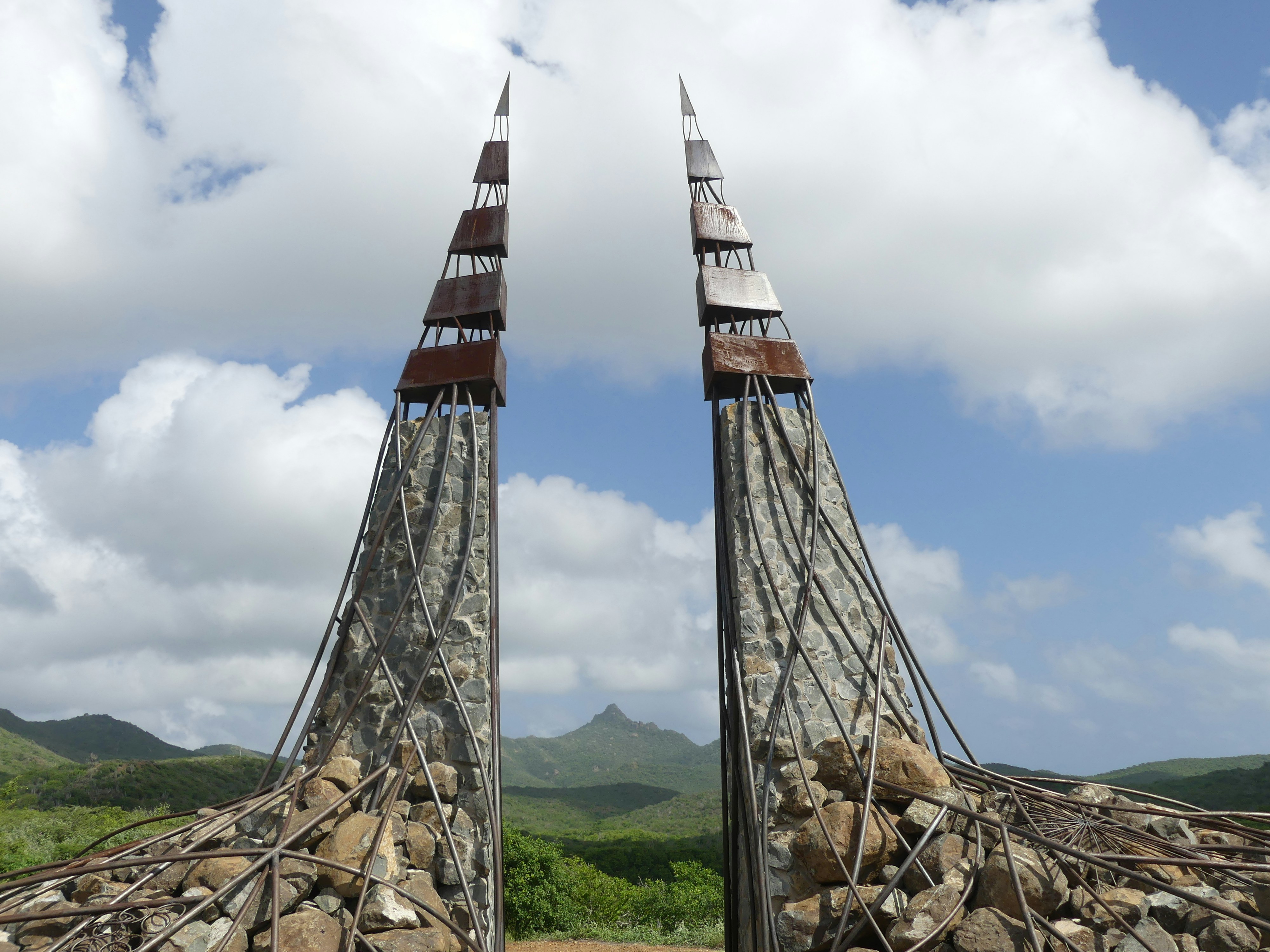 Sculptural stone pillars reaching toward the sky.