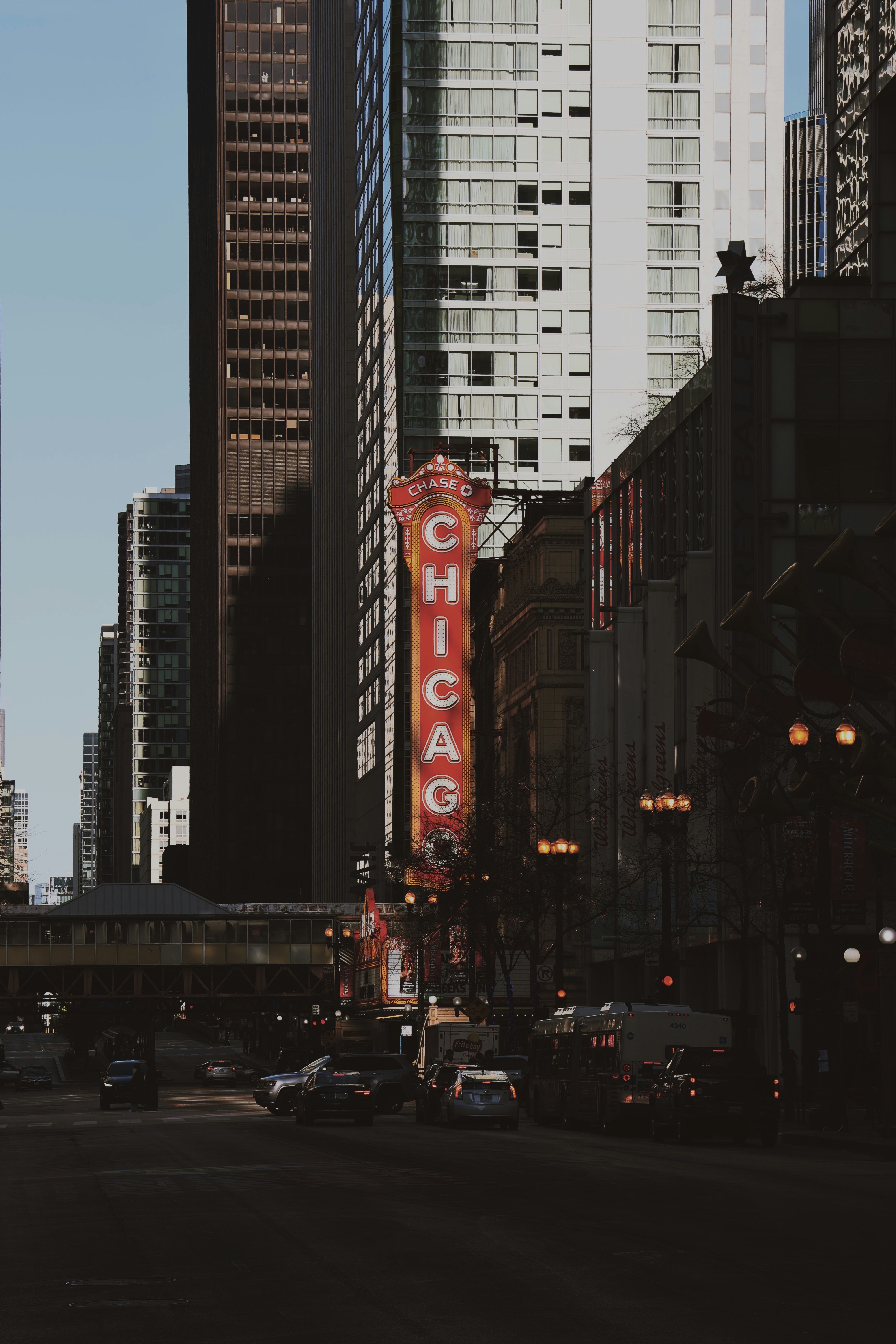 Chicago's iconic theater sign dominates the urban cityscape.