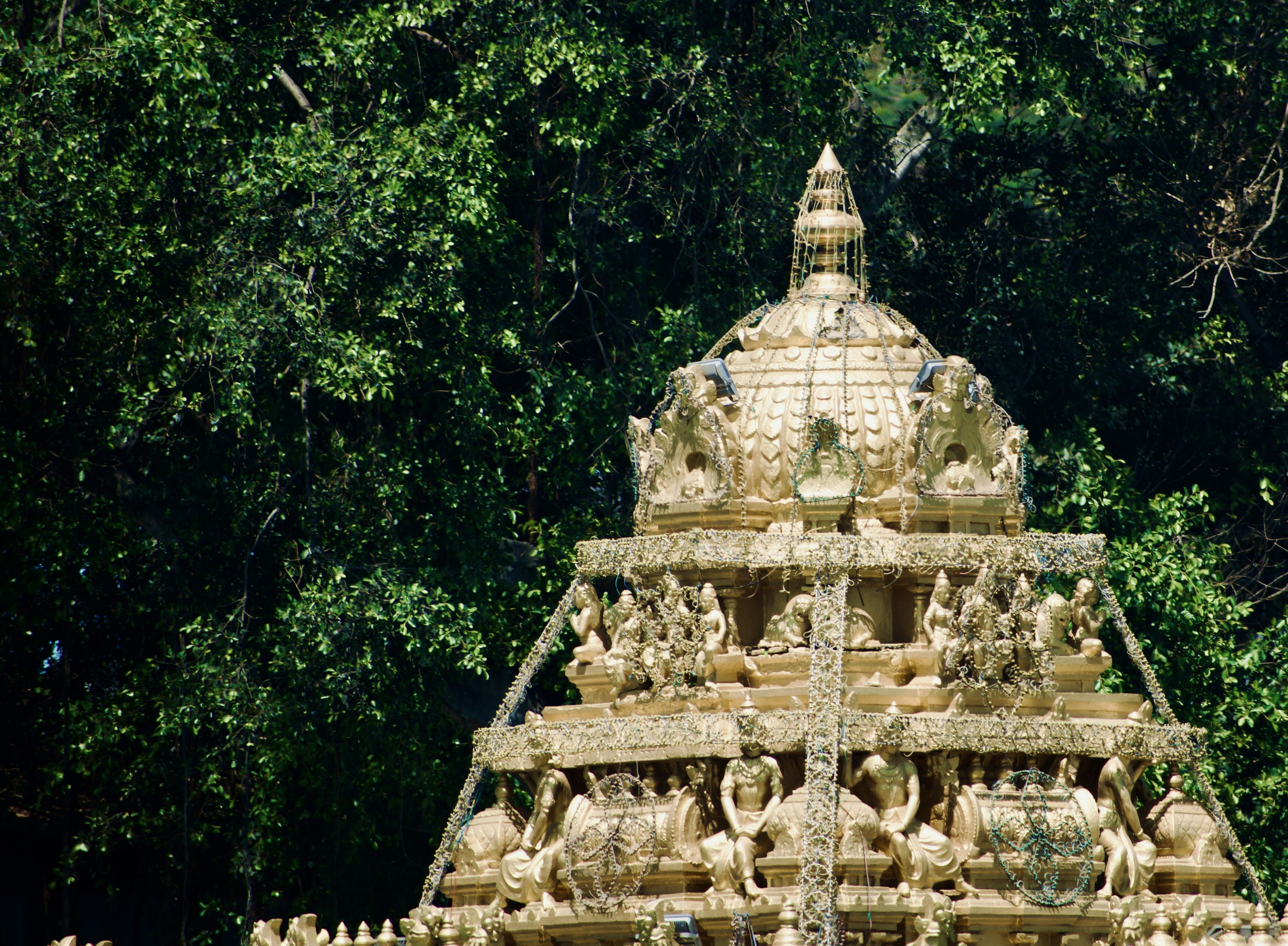 A beautiful temple amidst lush greenery.