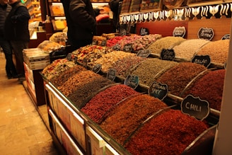 Spices are displayed at a market.