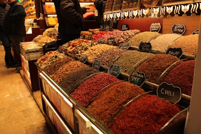 Spices are displayed at a market.