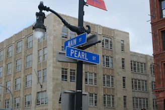 Street signs indicate main street and pearl street.