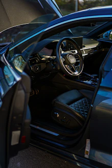 The interior of a luxurious audi car.