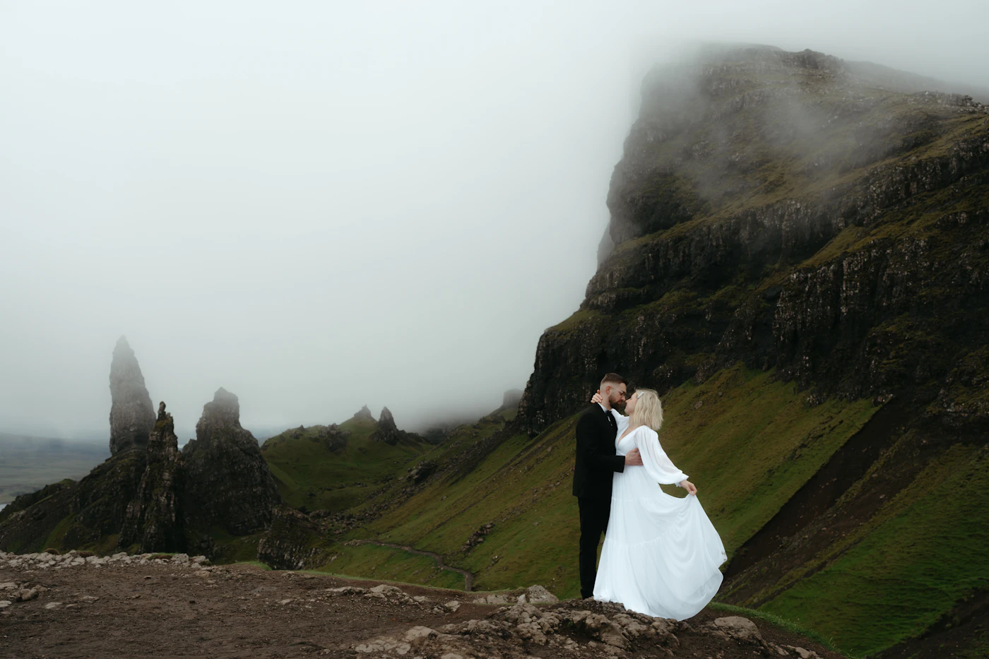 Elopement packages with officiant services in Colorado — A wedding officiant leads an intimate ceremony at a Colorado overlook