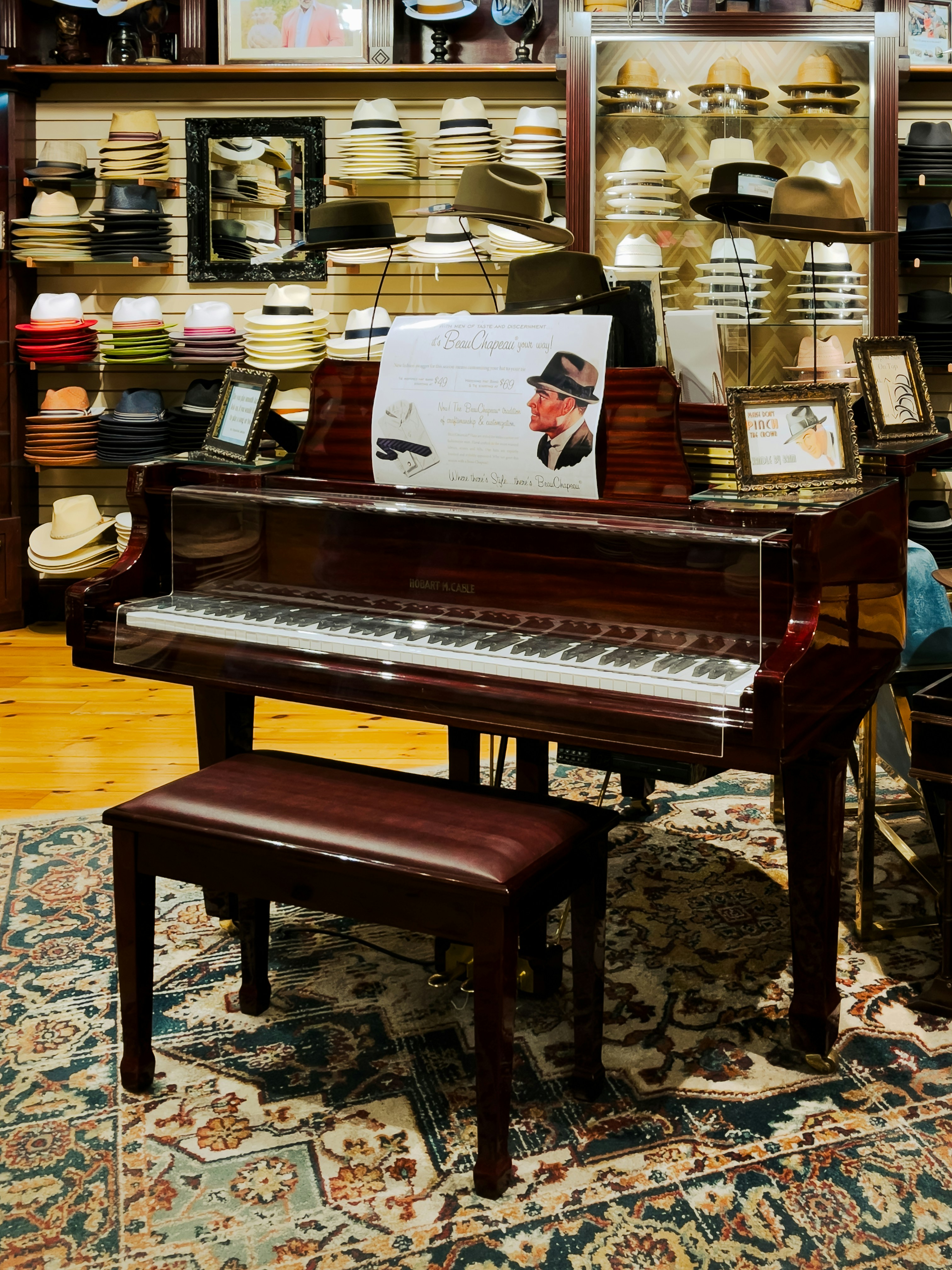 Piano and hat display showcase a retro aesthetic.