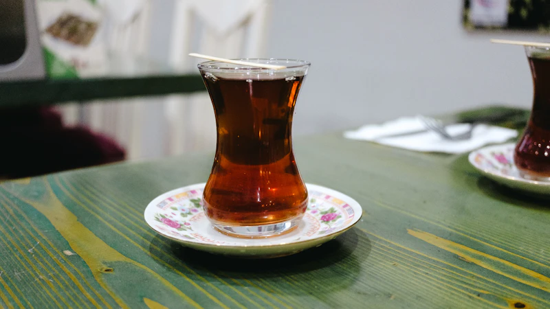 Turkish çay glass and copper cezve coffee pot