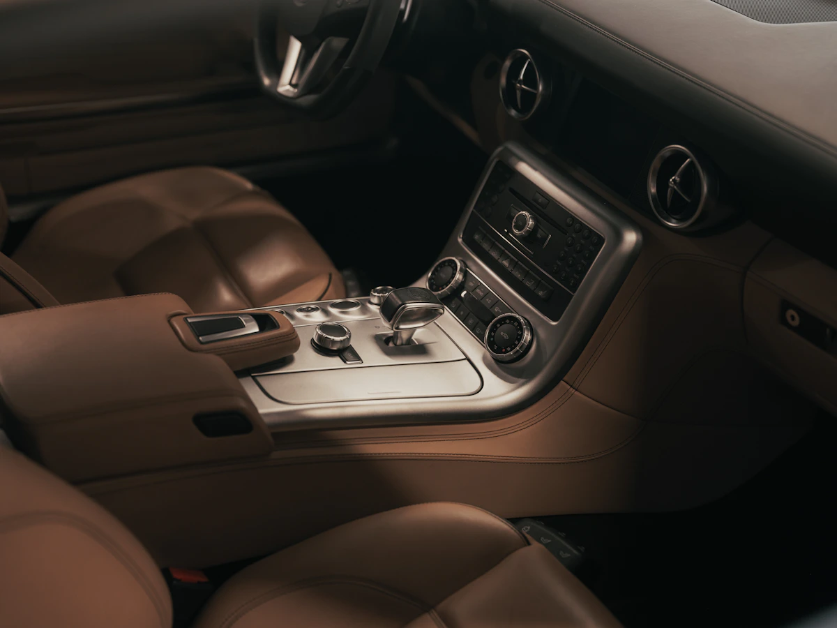 Modern luxury car interior with center console and dashboard controls