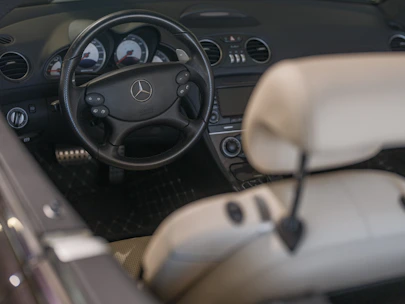 The interior of a mercedes-benz car is shown.