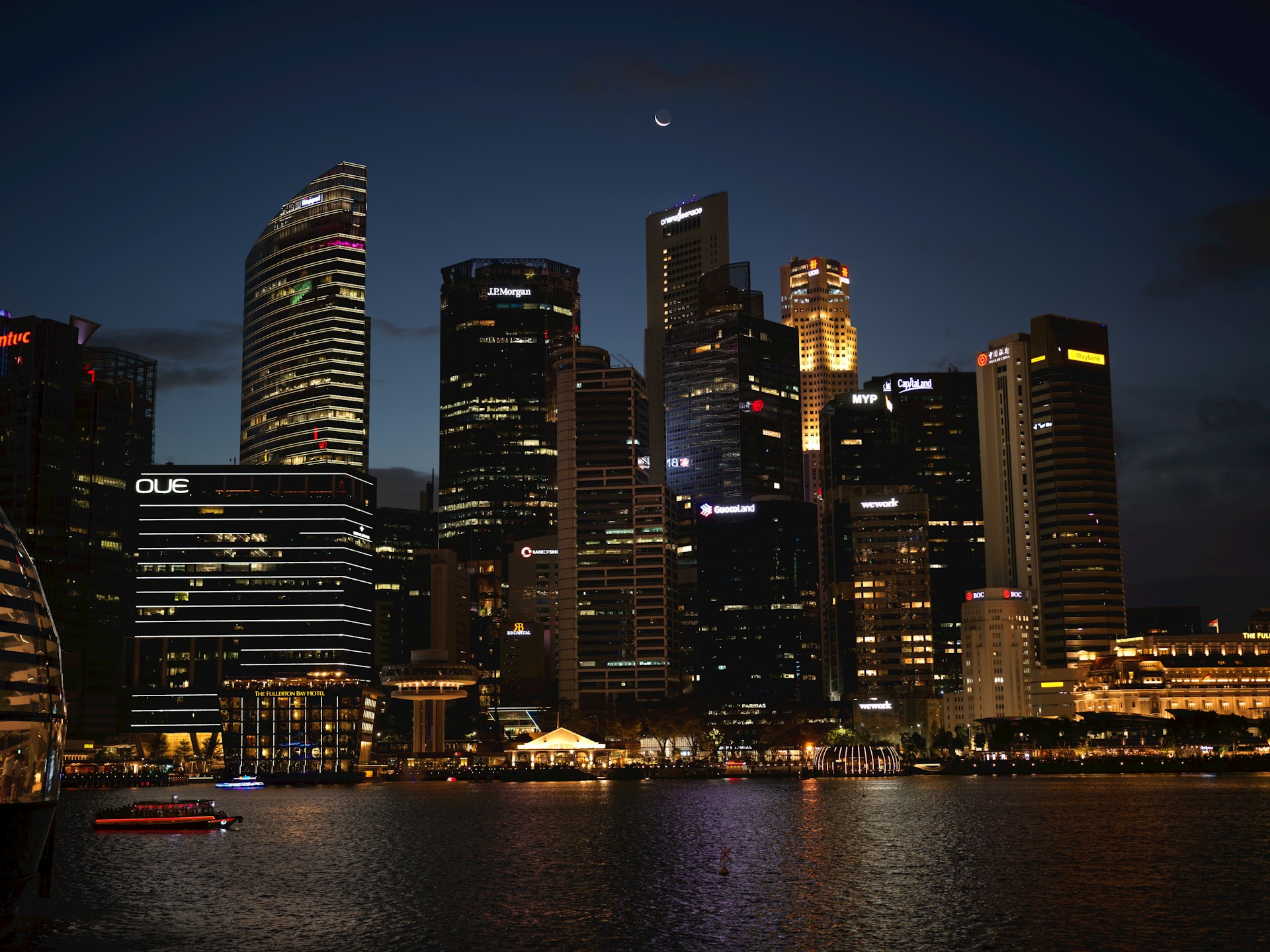 Skyscrapers light up the night skyline.