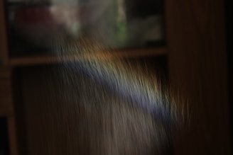 A rainbow appears inside from light.