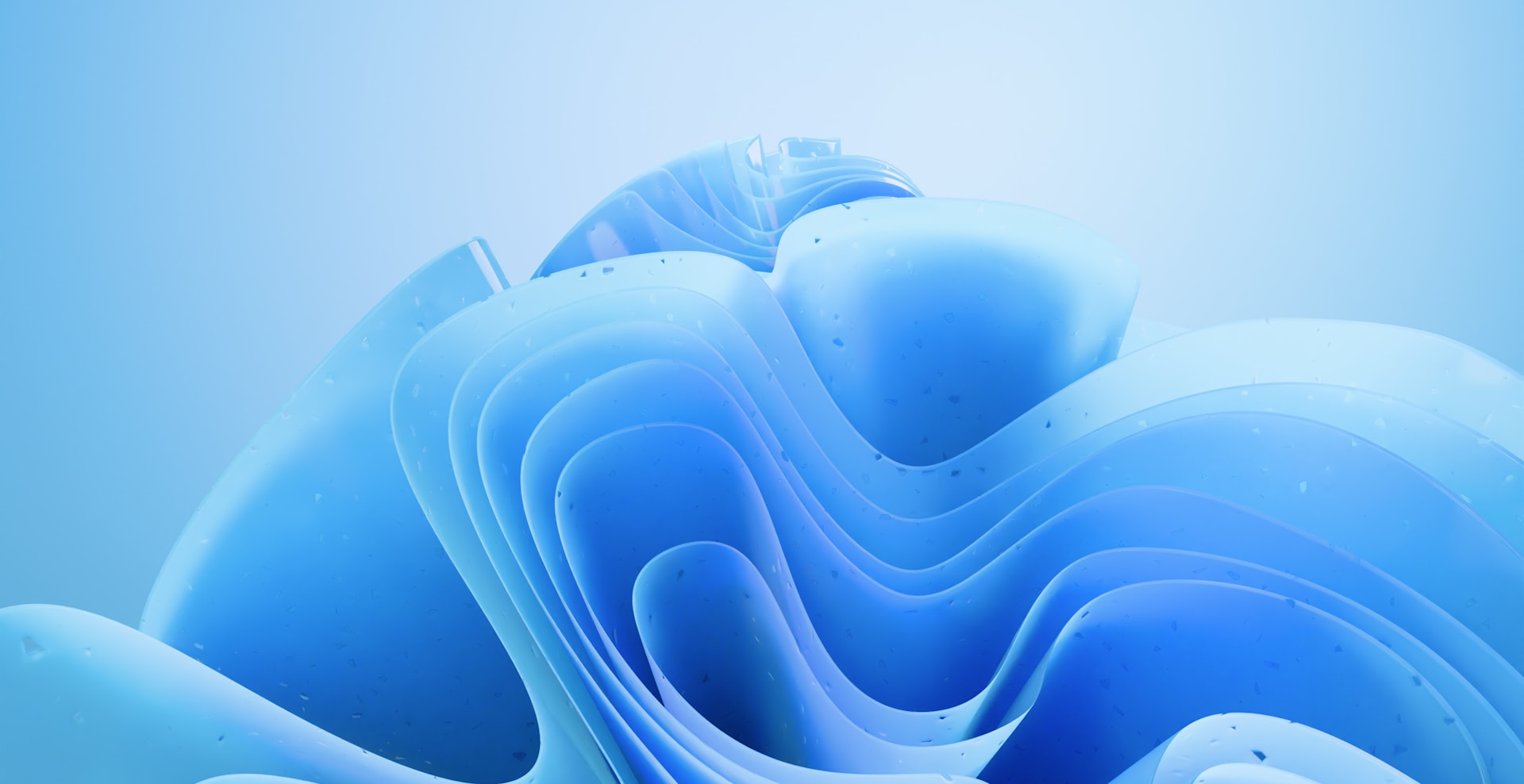 Abstract blue background with flowing, curved shapes.