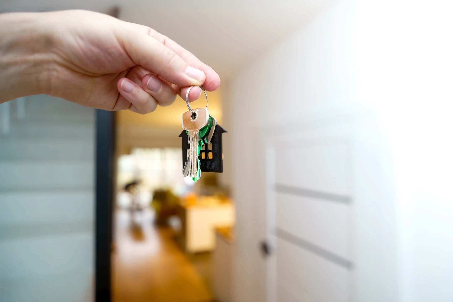 Handing over the keys at the front door on closing day