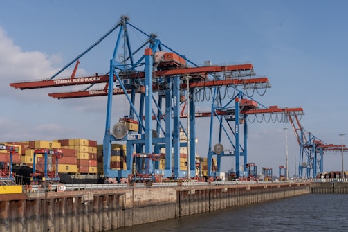 Harbor cranes ready to load and unload containers.
