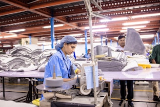 Woman works in a textile factory.