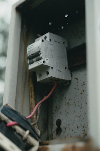 An electrical panel with circuit breakers inside.