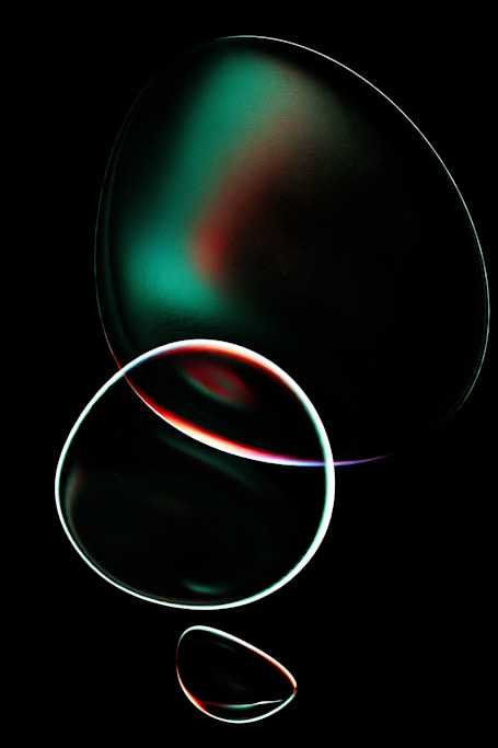 Abstract bubbles with colorful light reflections.