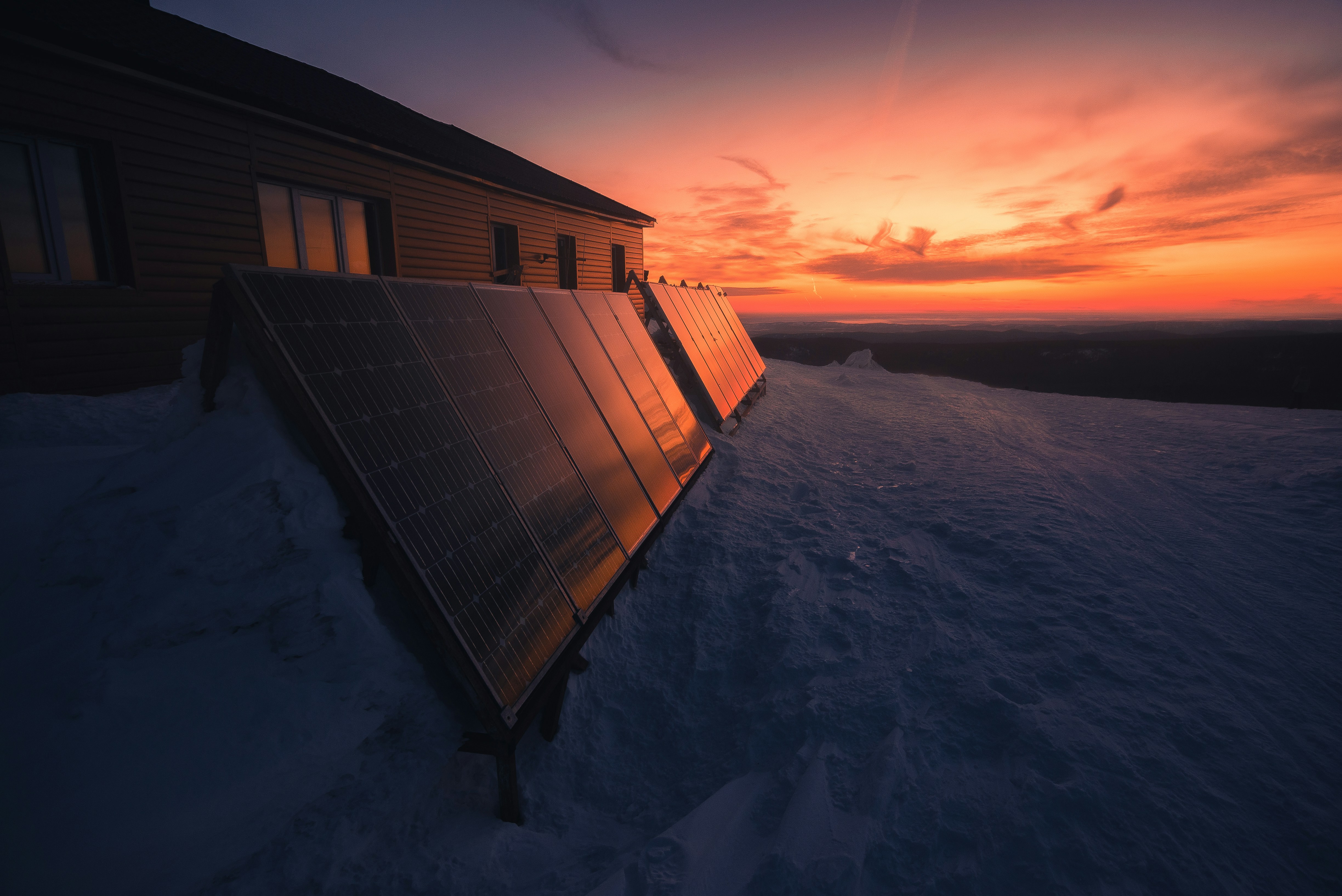 Solar panels reflecting sunset