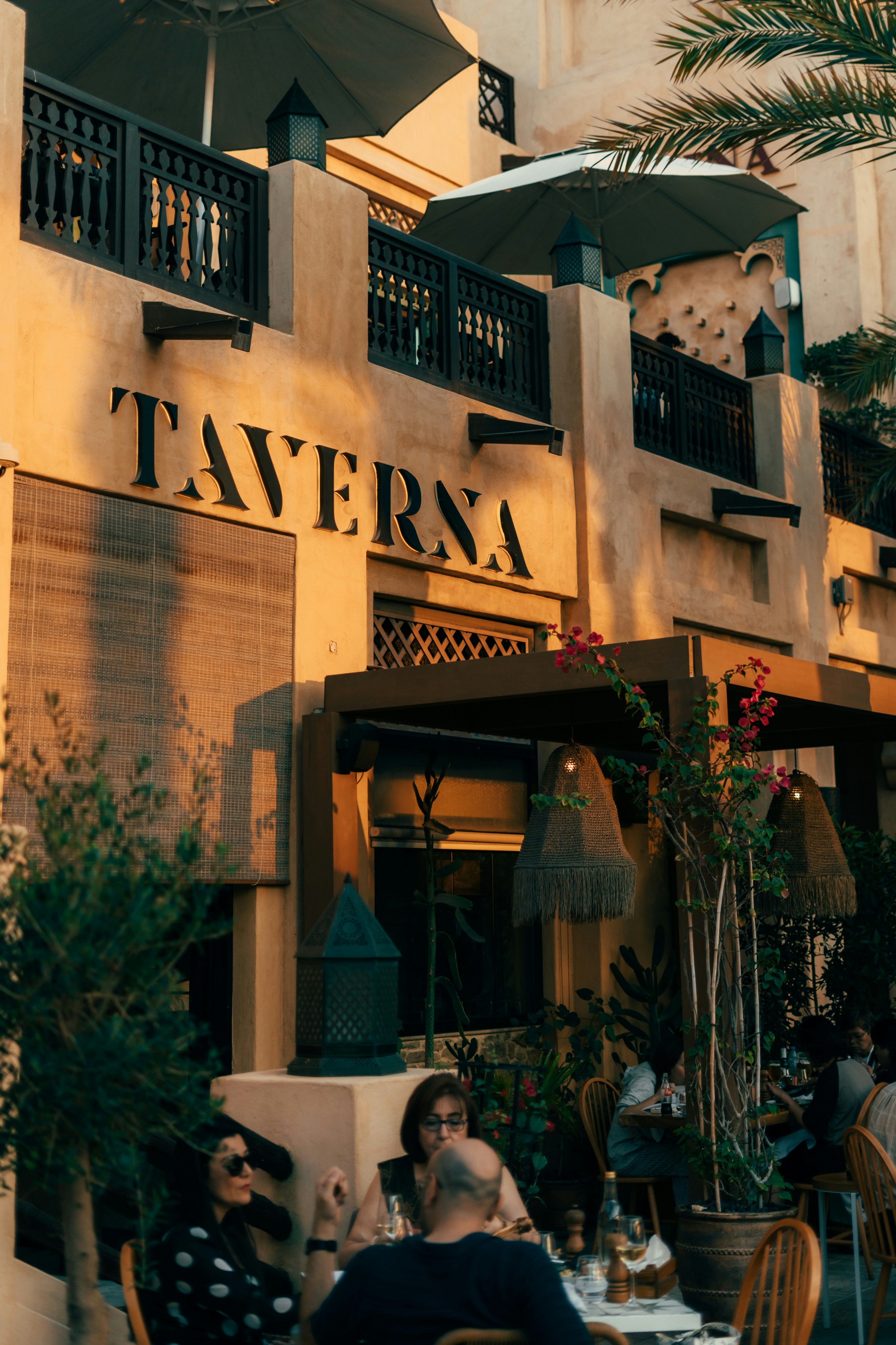 A restaurant called taverna with outdoor seating.