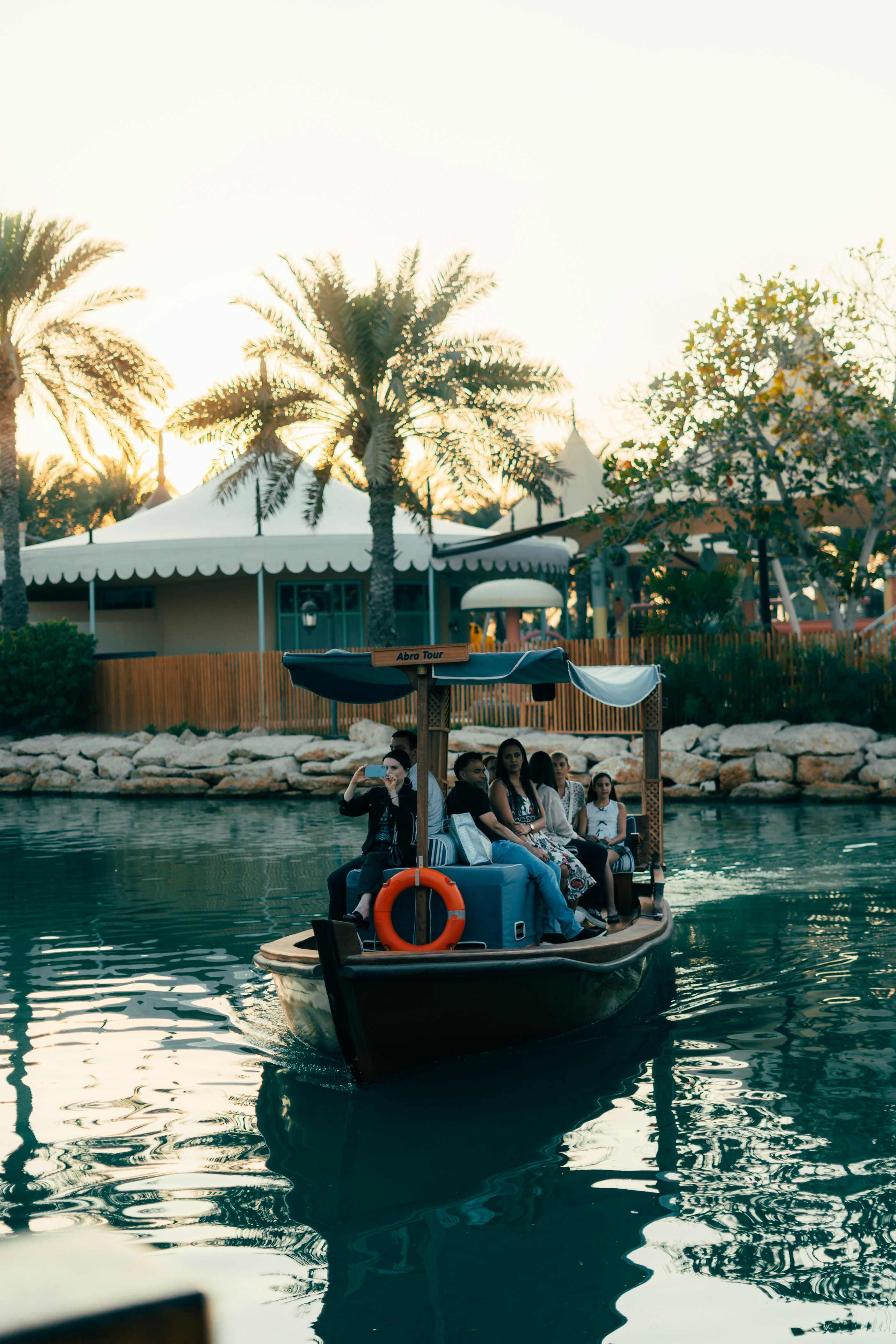 People enjoy a boat ride on the water.