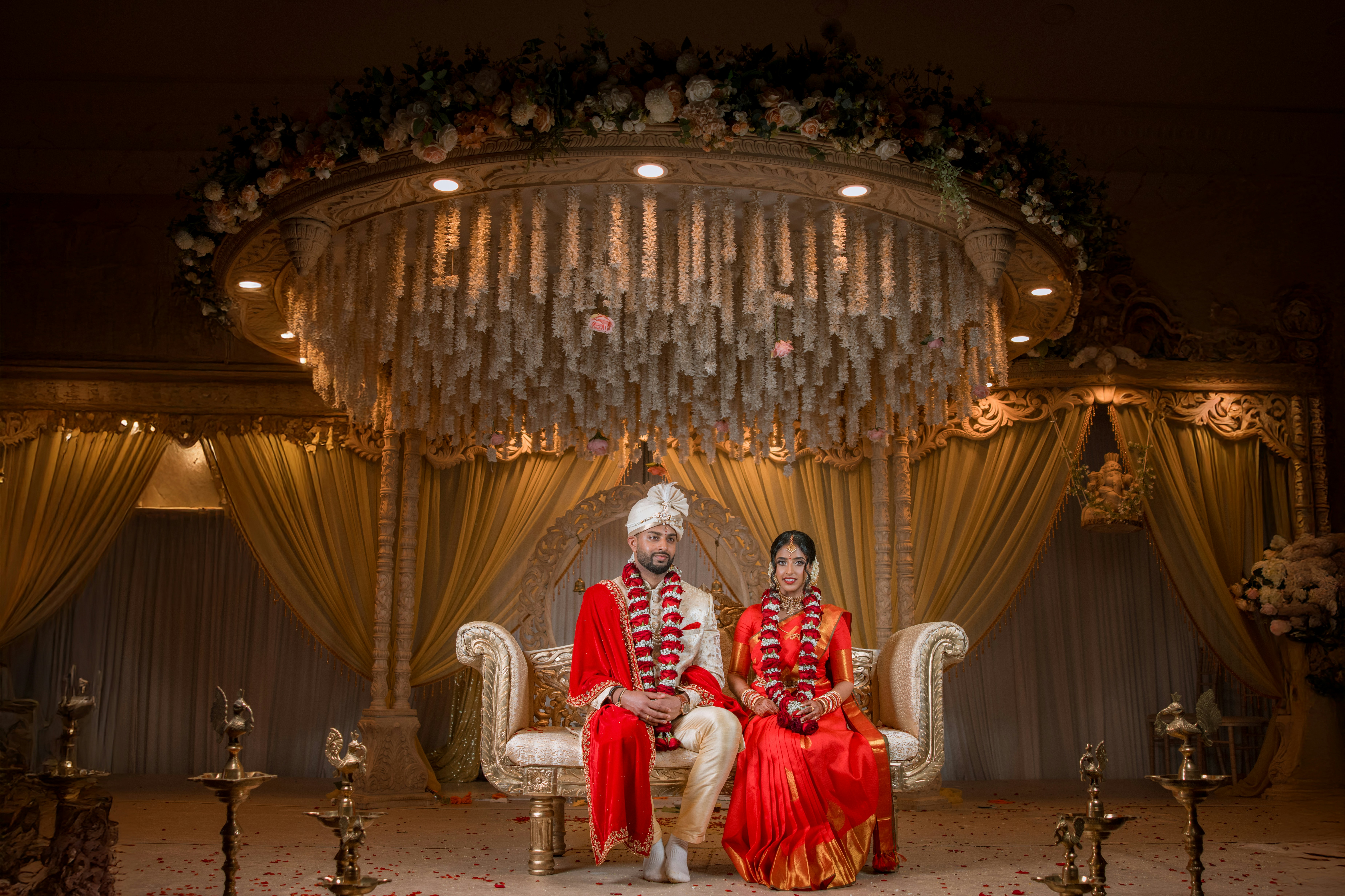 A couple is posing for their wedding photo