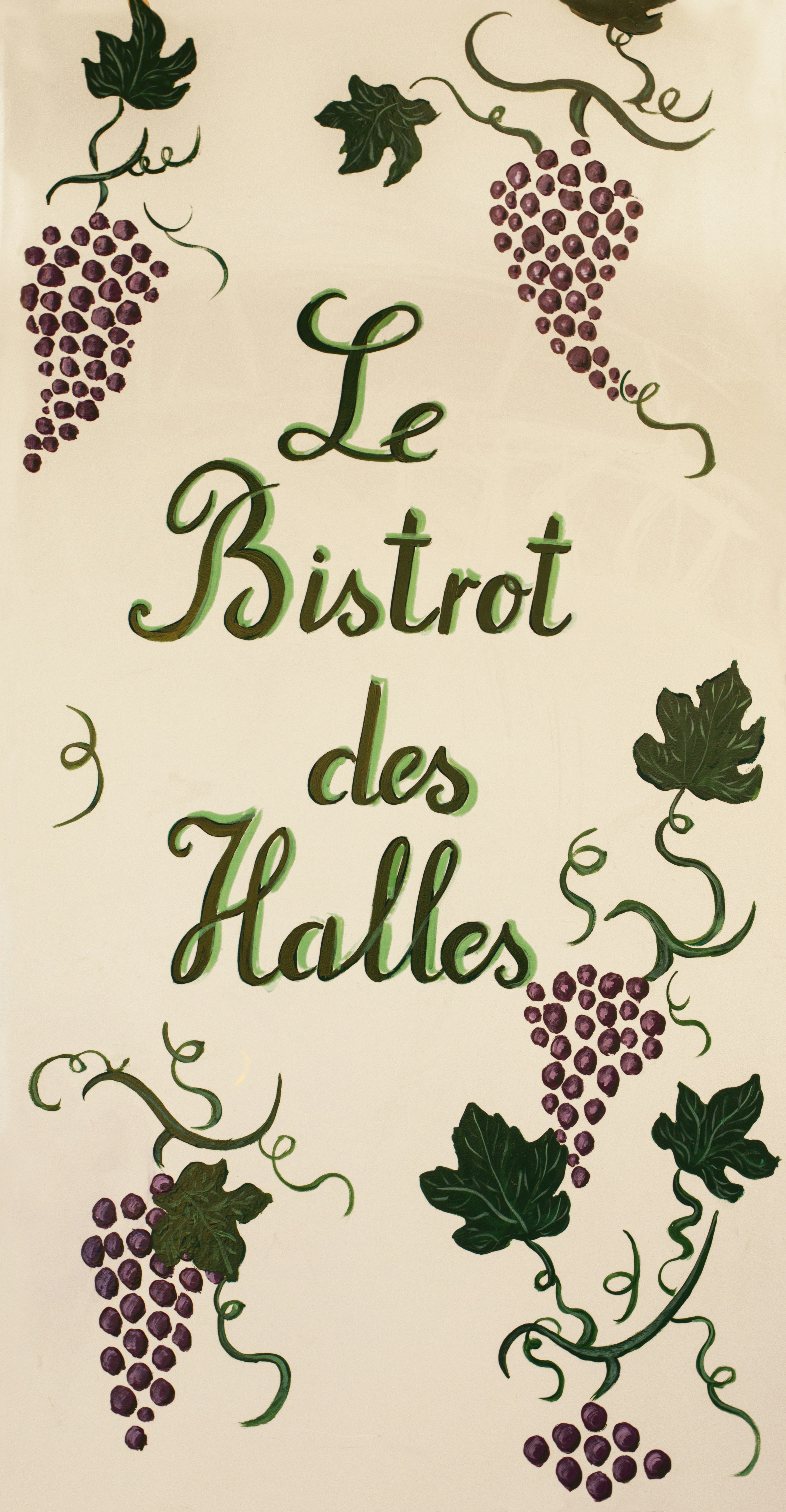 A bistro sign with grapes