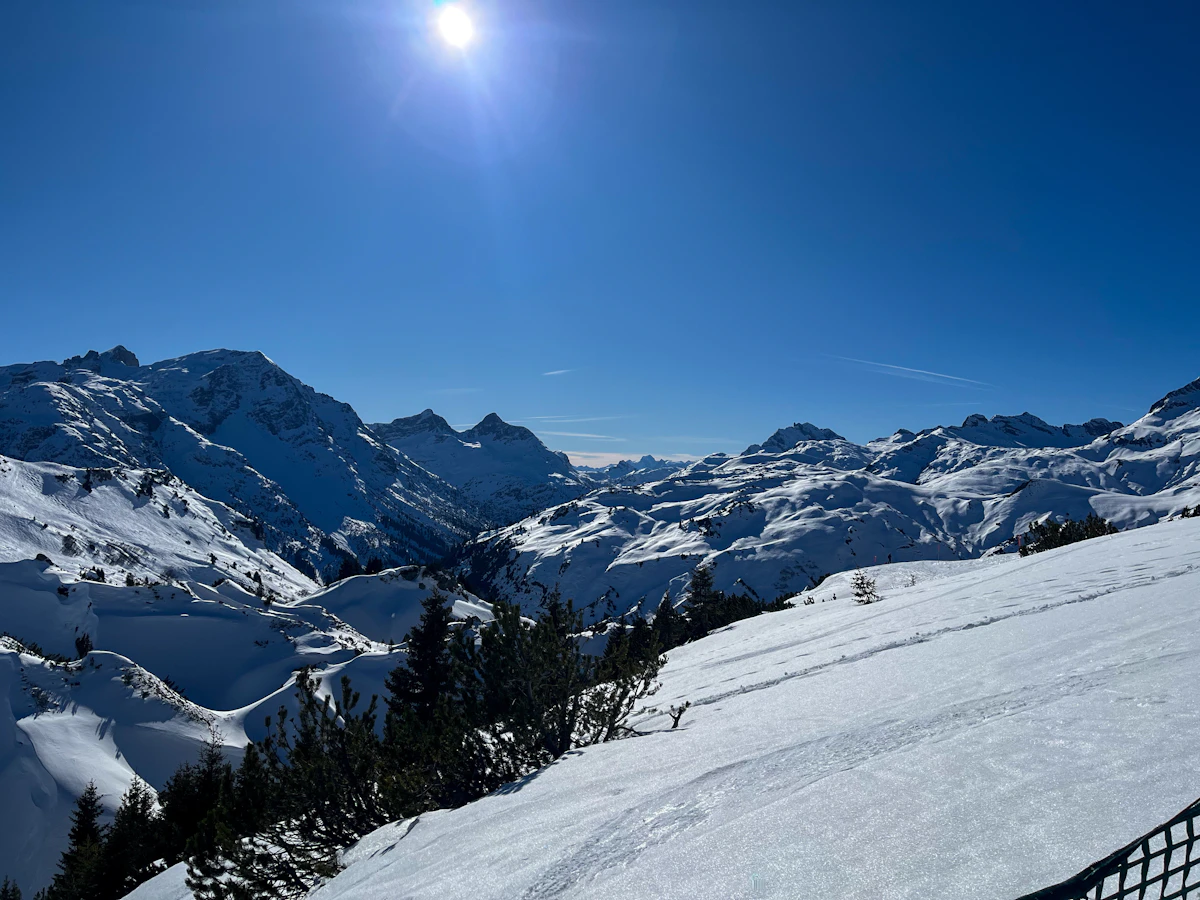 Snow-covered peaks and ski slopes in the Arlberg region