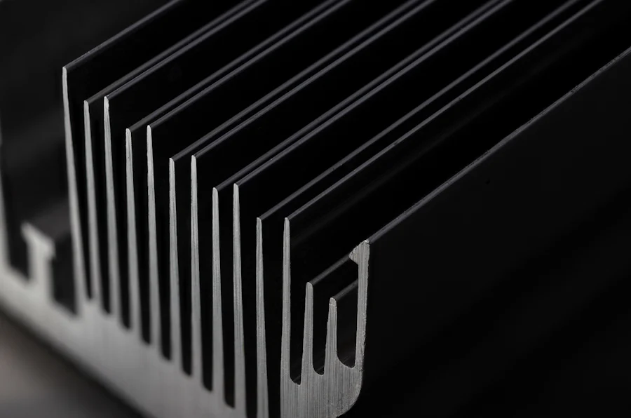 Close-up of a black anodised aluminium heat sink extrusion