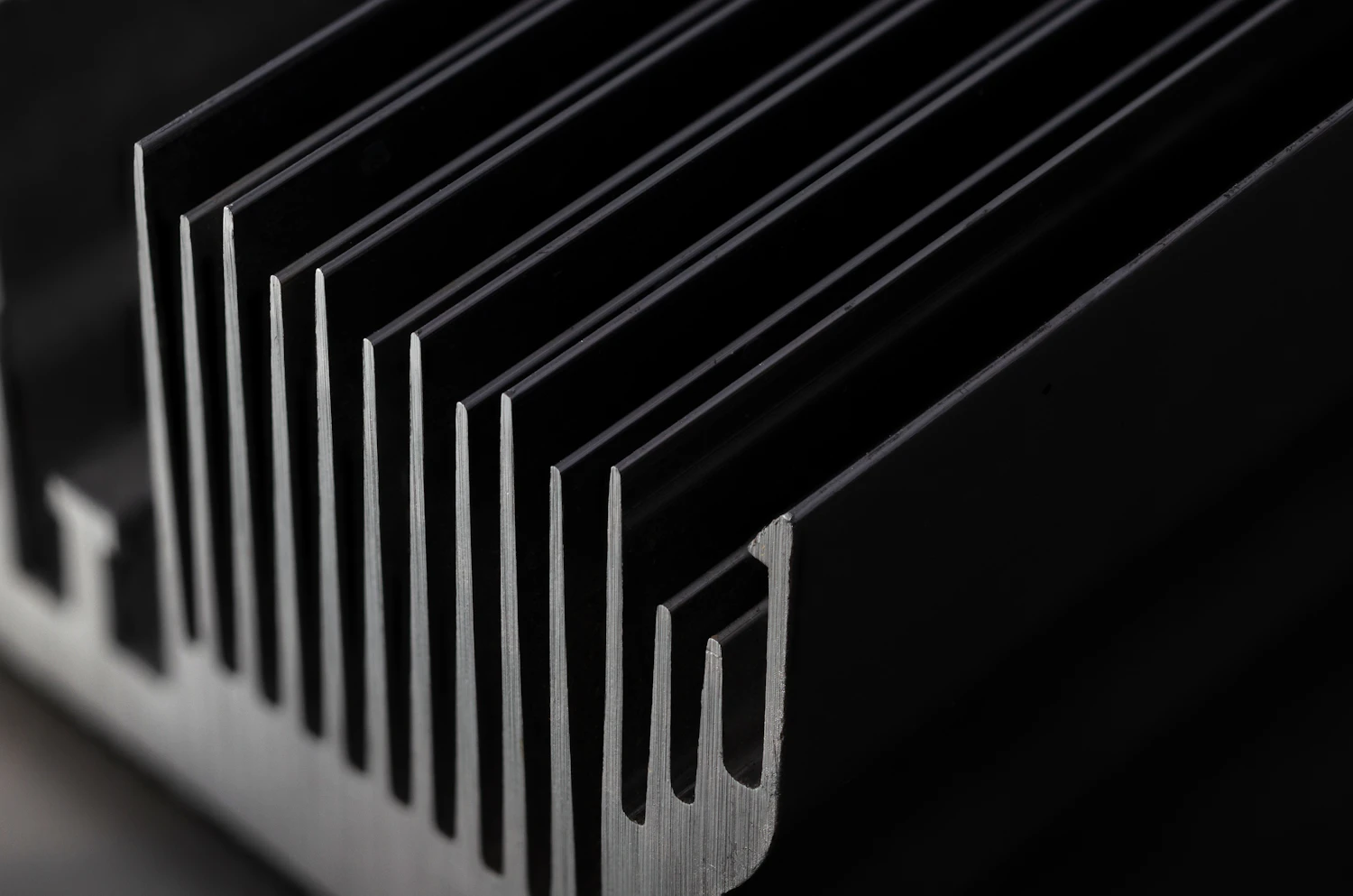 Close detail of a row of thin aluminium cooling fins