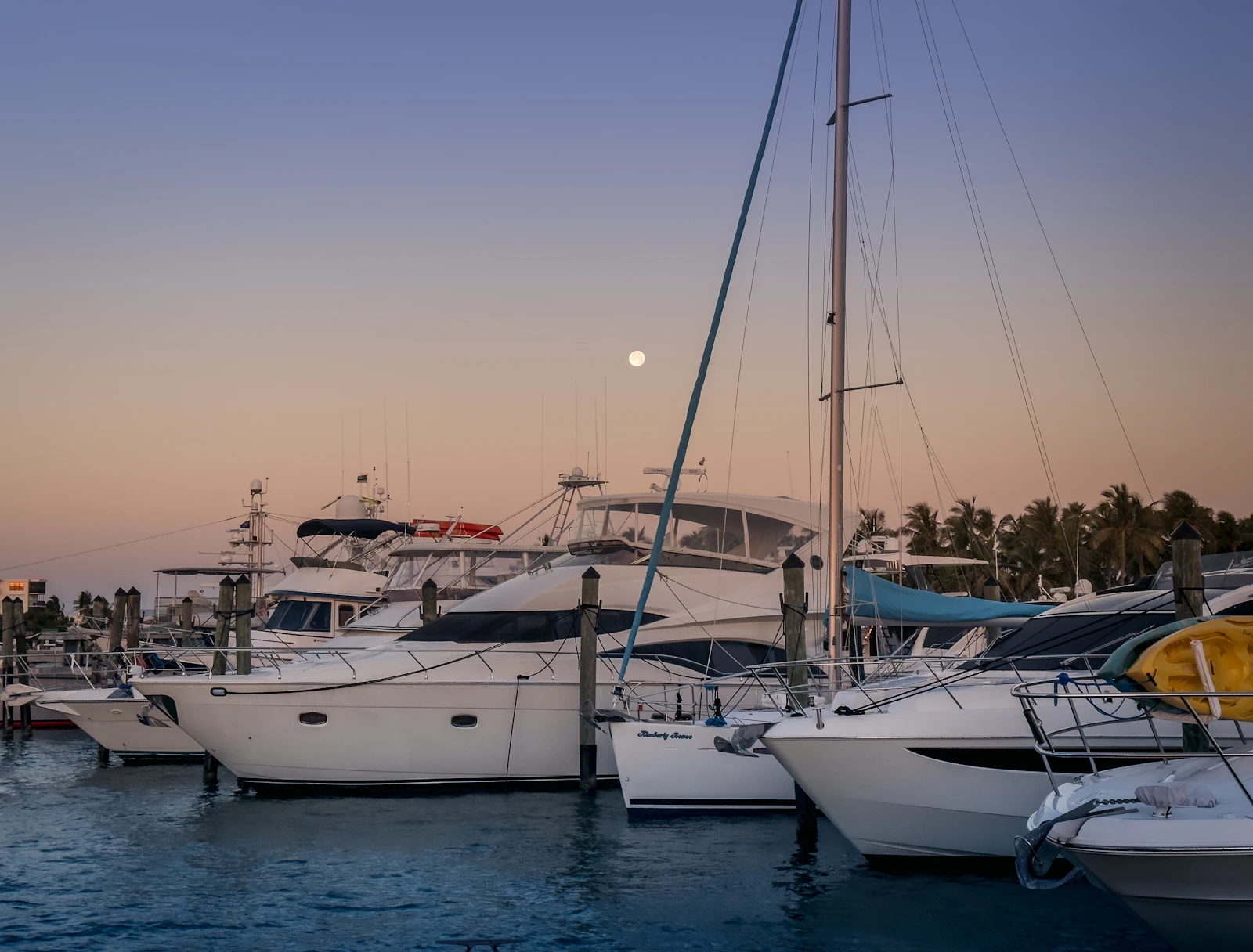 Private charter boat docked at sunset