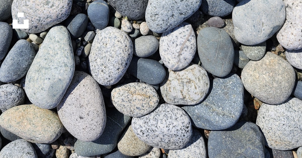 A collection of rounded rocks and pebbles. photo – Free Abstract Image ...