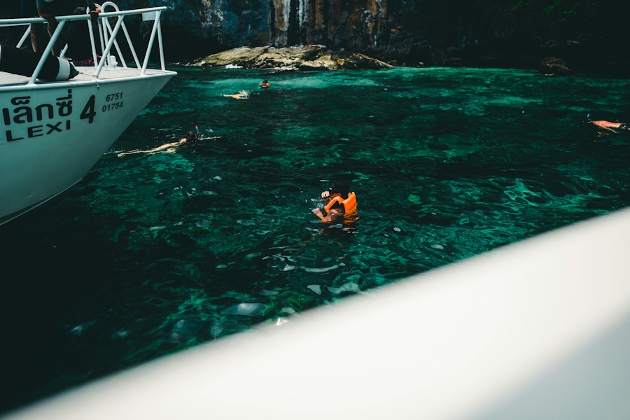 People snorkeling in clear turquoise water