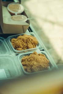 Delicious dessert displayed in a glass case.