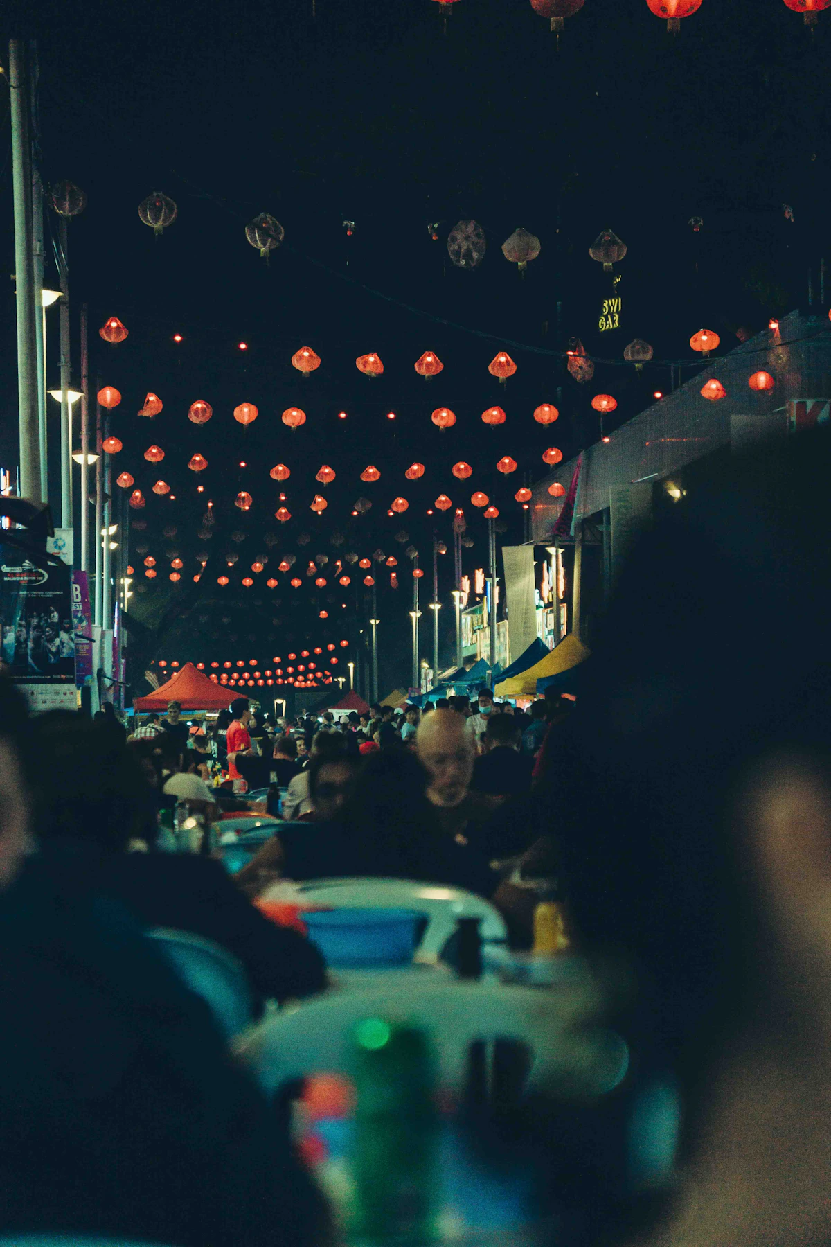 Street-food stalls and lanterns at a night market
