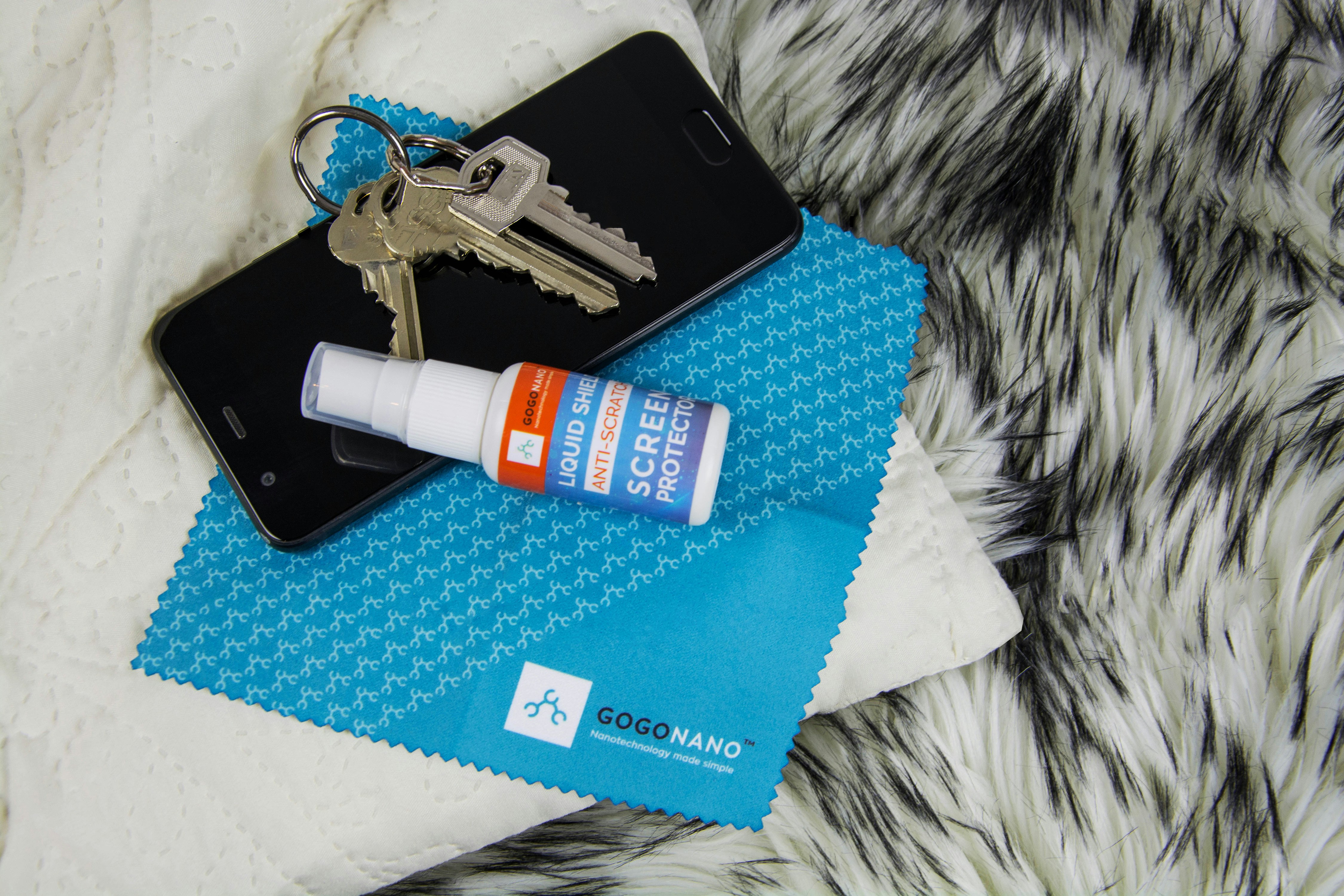 Travel-sized skincare products neatly organized in a clear bag.