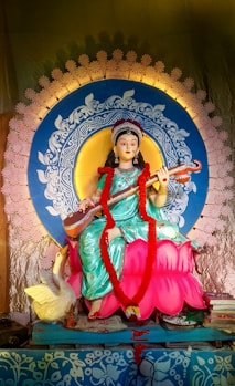 A statue of the hindu goddess saraswati.