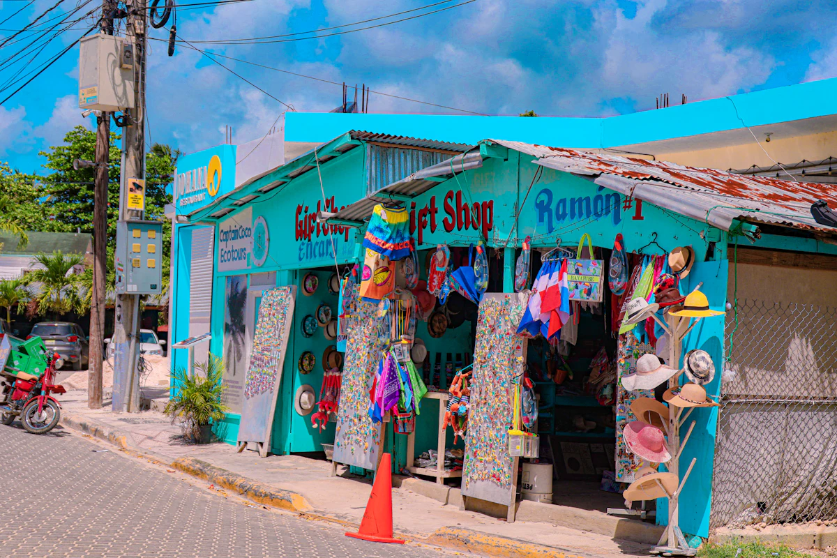 Colourful storefronts on a Philippine street showing creative business signage