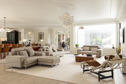 A spacious and bright living room is shown.