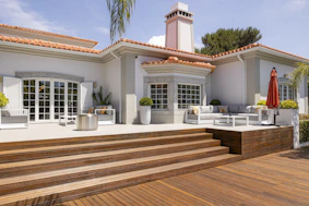 A beautiful house features an outdoor patio.