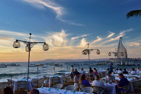 Beachside restaurant enjoys a beautiful sunset view.