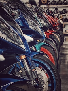 Motorcycles lined up in a showroom.