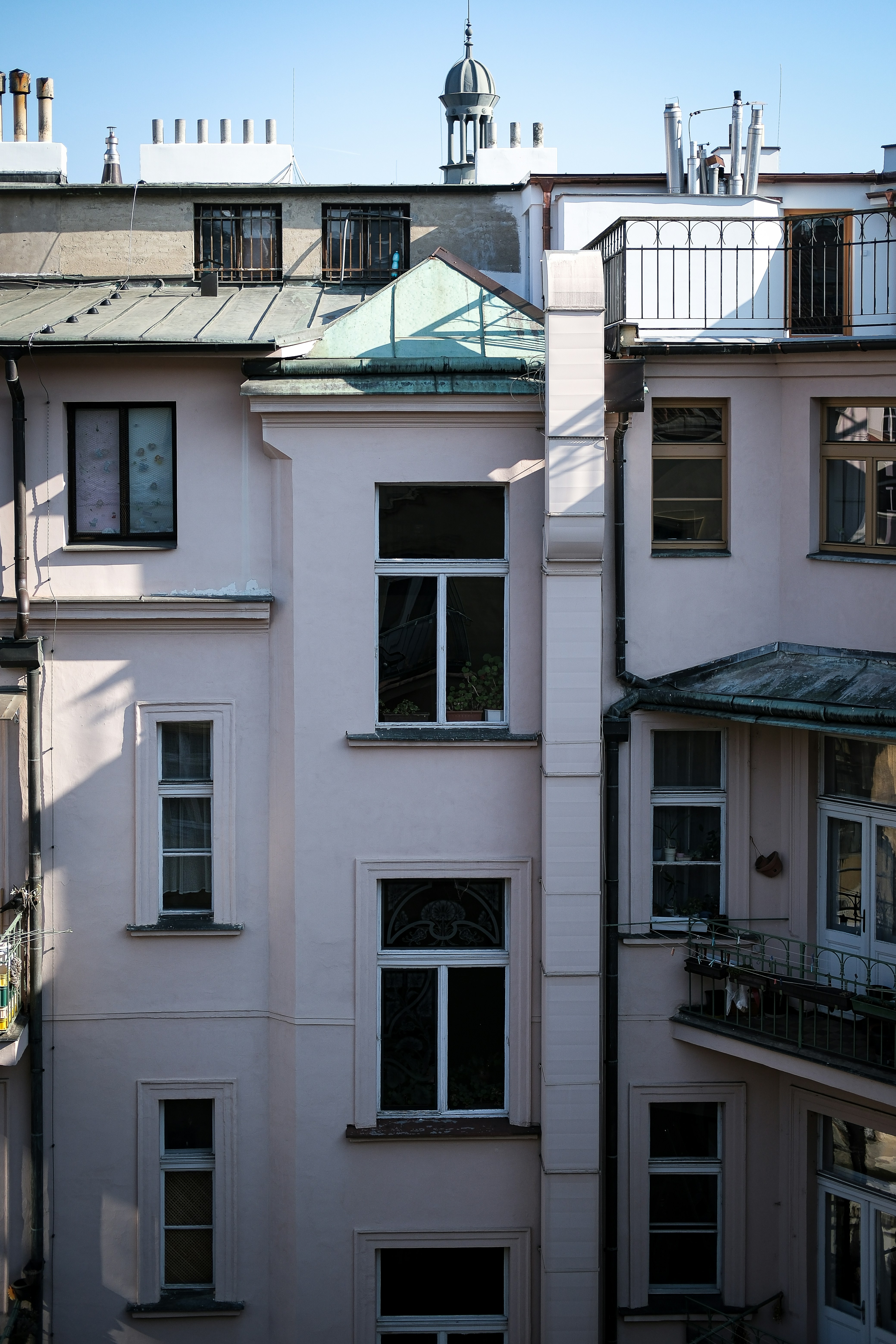 Buildings with many windows and architectural details.