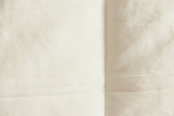 Material textil ivoriu cute detaliu