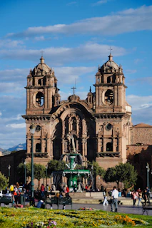 A beautiful cathedral with intricate stonework and sky.