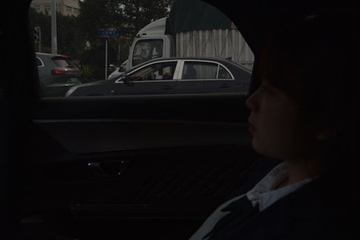 Looking outside a car window at traffic.