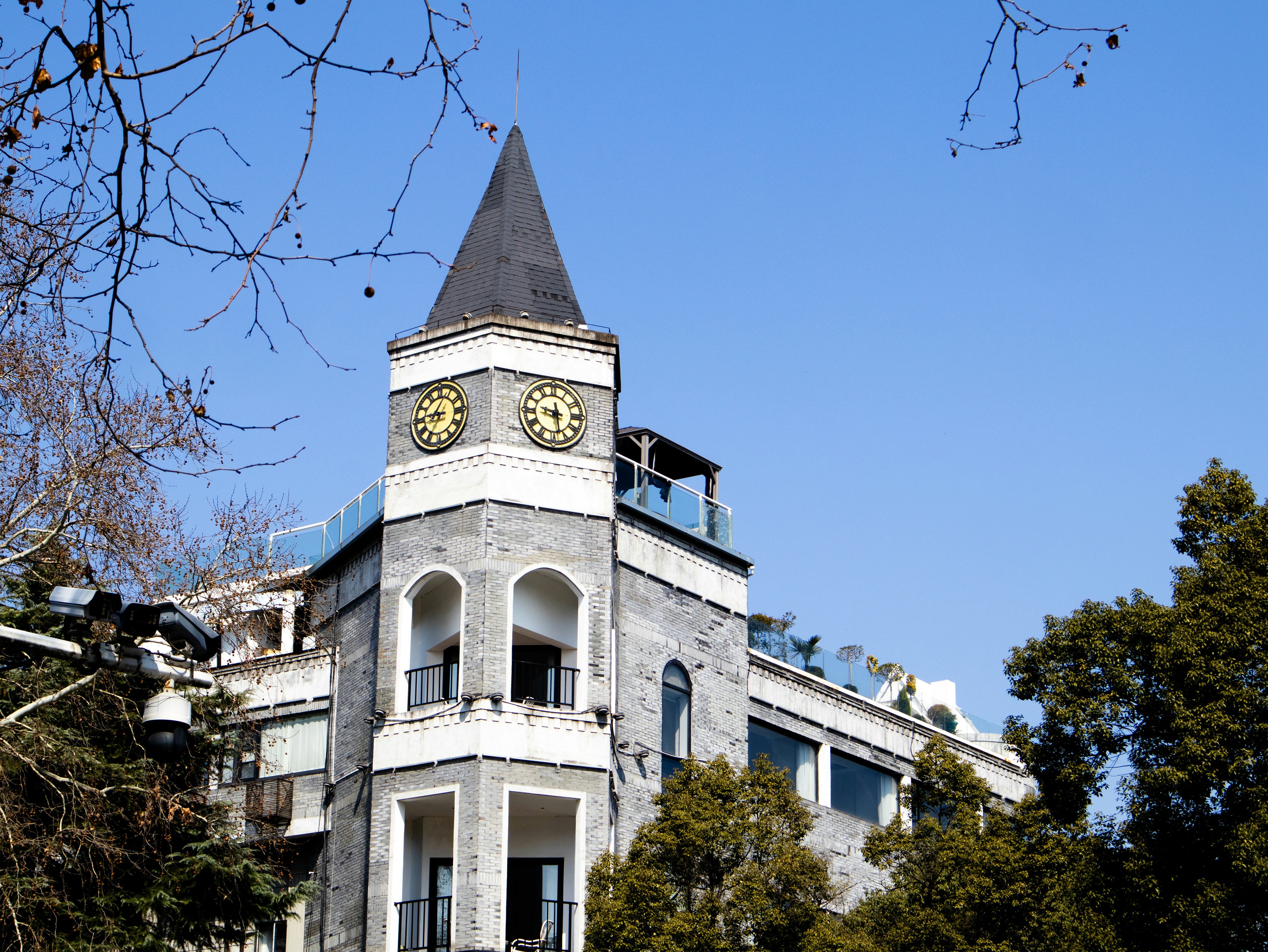 A building with a clock tower stands tall.